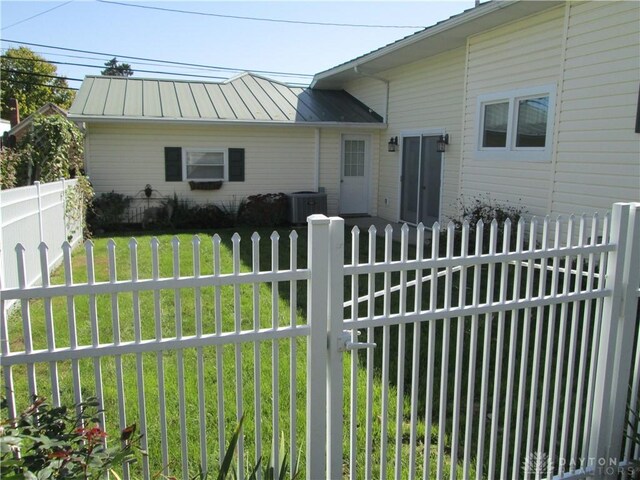204 N Main St, Lewisburg, OH 45338 - back of house with a standing seam roof, metal roof, and central AC unit