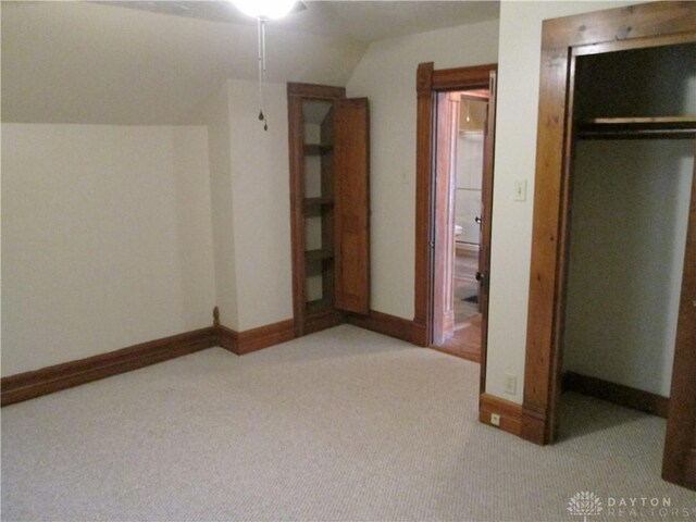 204 N Main St, Lewisburg, OH 45338 - bonus room with carpet floors, vaulted ceiling, a ceiling fan, and baseboards