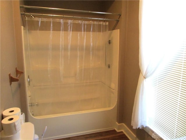 204 N Main St, Lewisburg, OH 45338 - full bathroom featuring shower / bath combination with curtain, toilet, and wood finished floors