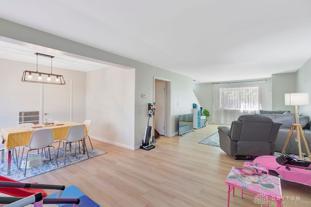 living room with light hardwood / wood-style floors