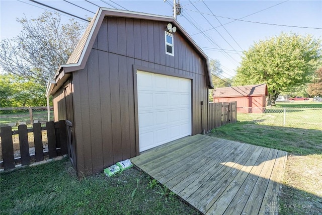 garage with a yard