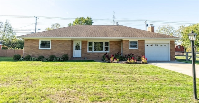 ranch-style home with a front lawn and a garage