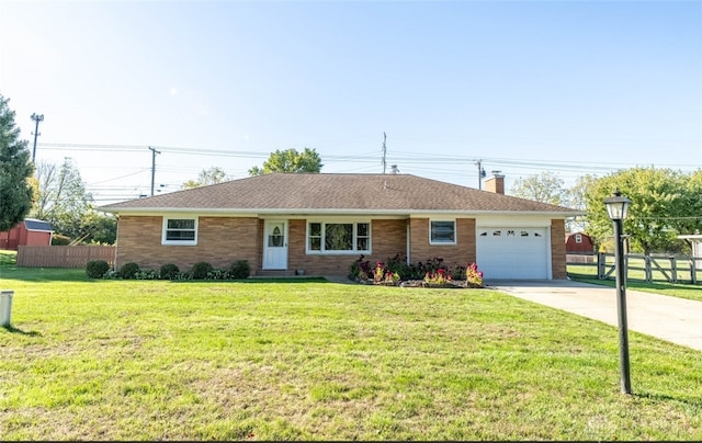 ranch-style house with a front lawn and a garage