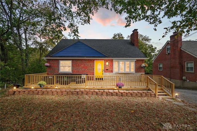 view of front of home with a deck