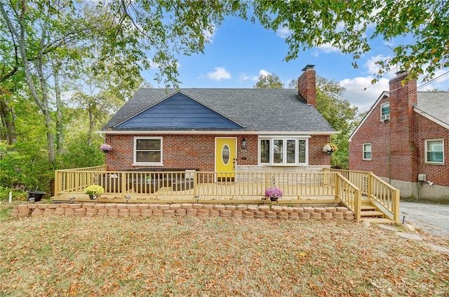 view of front of property with a wooden deck