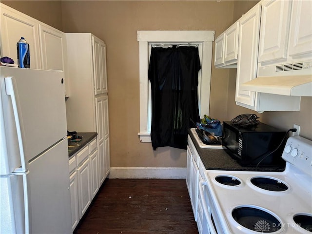 kitchen featuring white appliances, dark hardwood / wood-style floors, and white cabinets