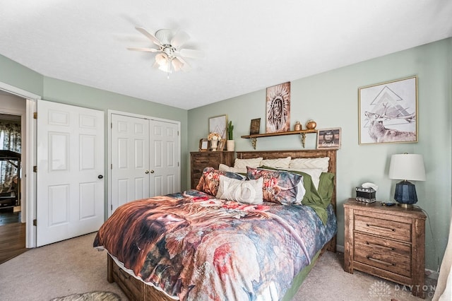 carpeted bedroom featuring ceiling fan