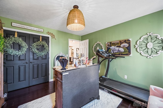 exercise area with hardwood / wood-style floors