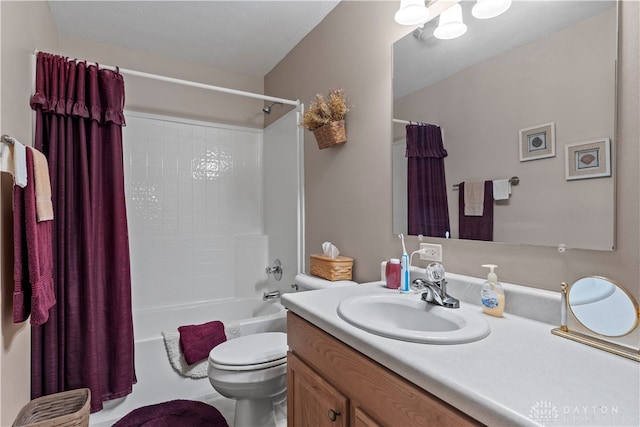 full bathroom featuring shower / tub combo with curtain, vanity, and toilet