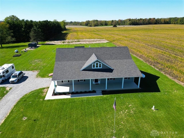 birds eye view of property featuring a rural view