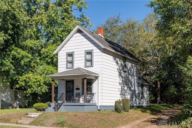 view of front of property featuring covered porch