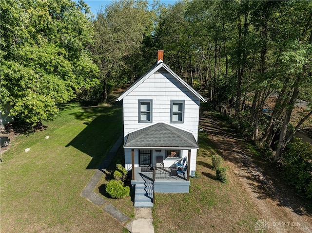 view of front facade with a porch and a front yard