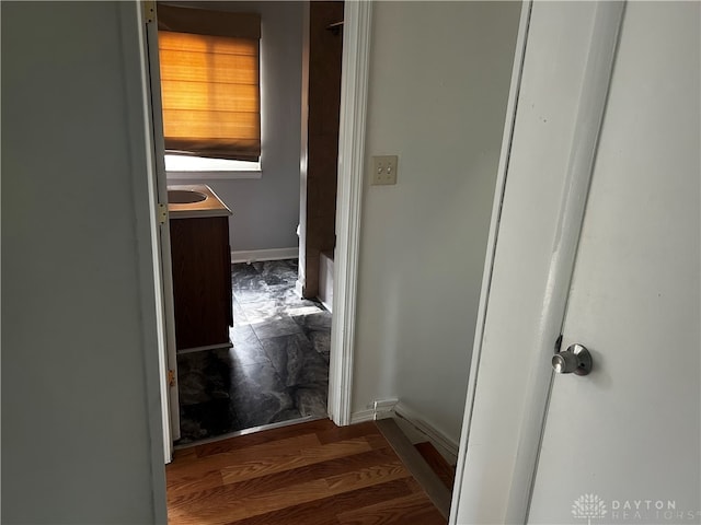 hallway featuring hardwood / wood-style flooring