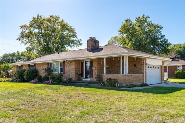 ranch-style home with a front yard and a garage