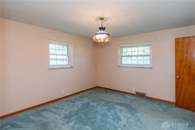 view of carpeted spare room