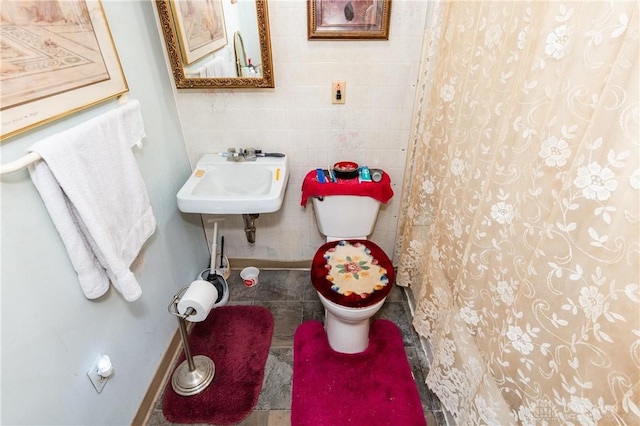 bathroom with toilet and sink