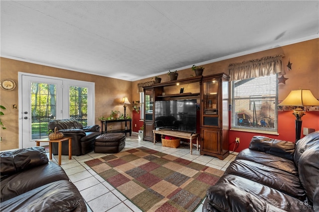 living room with light tile patterned floors, a textured ceiling, and crown molding