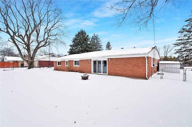 view of snow covered house