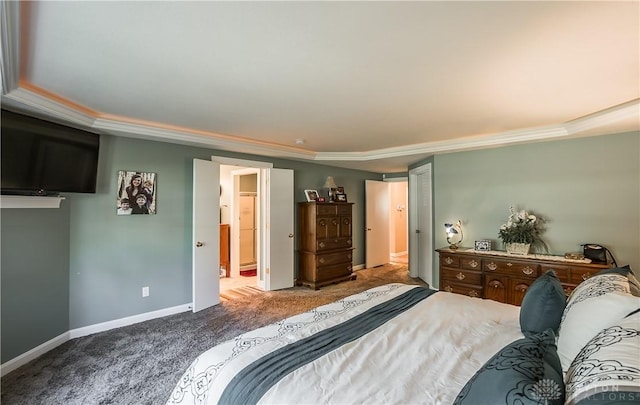 bedroom featuring ensuite bath and carpet floors