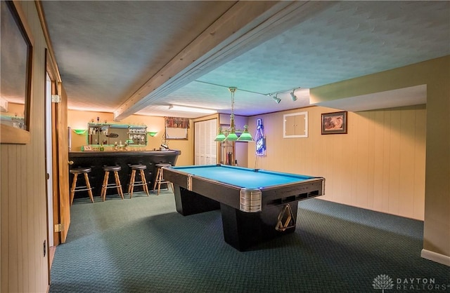 playroom with beamed ceiling, carpet floors, a bar, and pool table