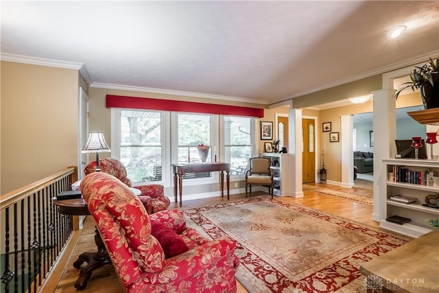 living room featuring crown molding and wood-type flooring