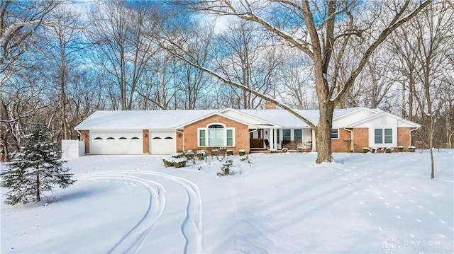 ranch-style home featuring a garage