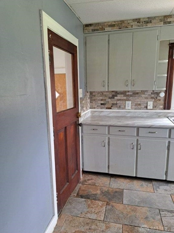 kitchen featuring backsplash