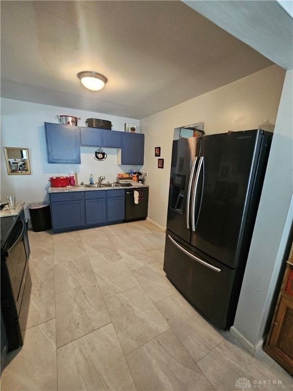 kitchen with black dishwasher, stainless steel fridge with ice dispenser, sink, and blue cabinets