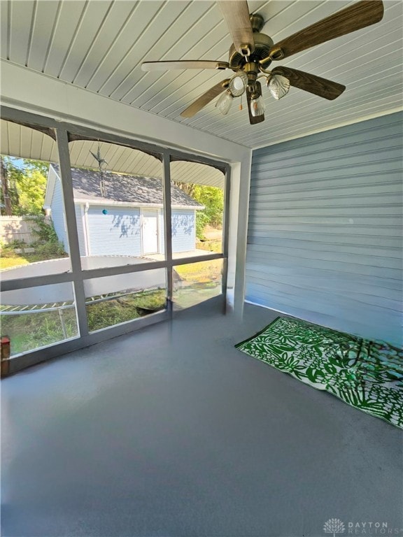 unfurnished sunroom with a wealth of natural light