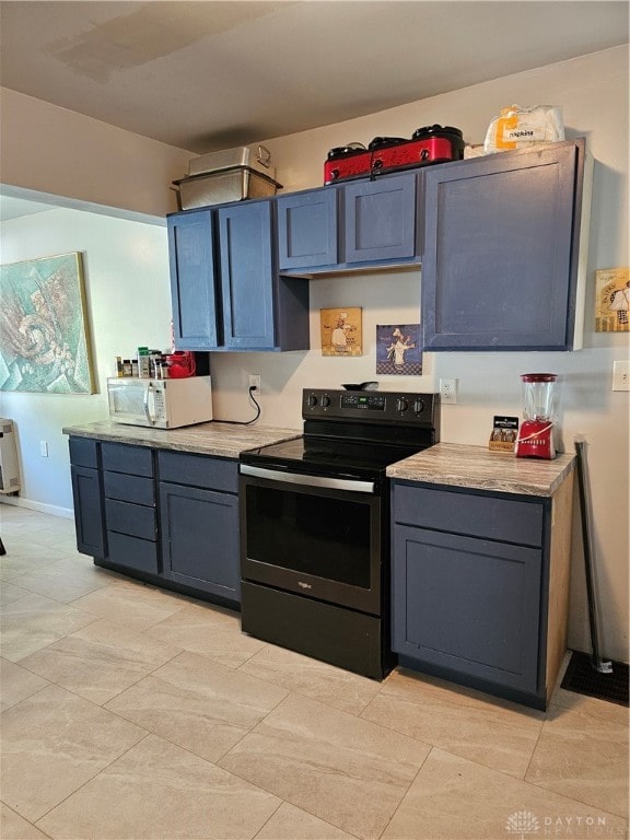 kitchen with stainless steel electric stove