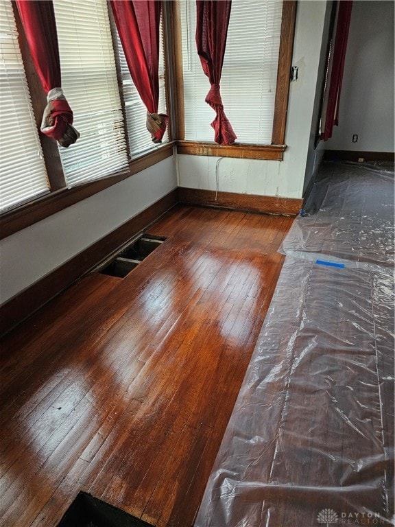 spare room featuring hardwood / wood-style flooring