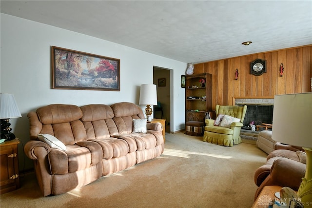 living room with wooden walls and carpet