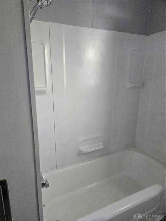 full bath featuring shower / washtub combination