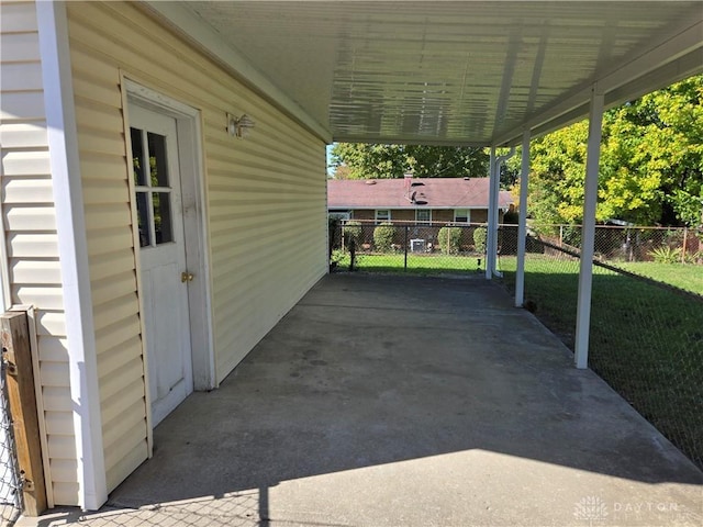 view of patio featuring fence