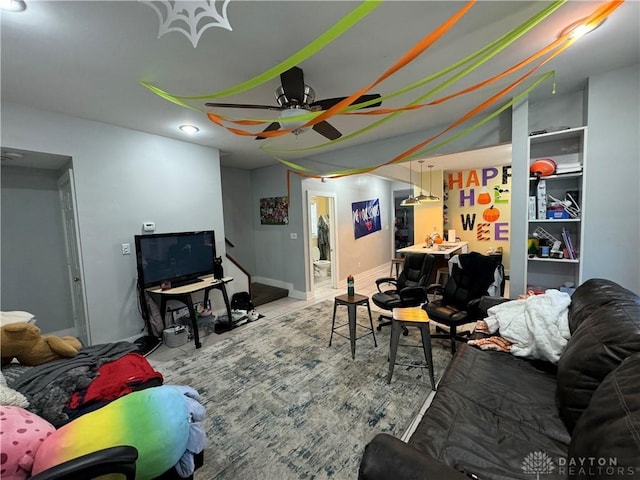 living room with ceiling fan