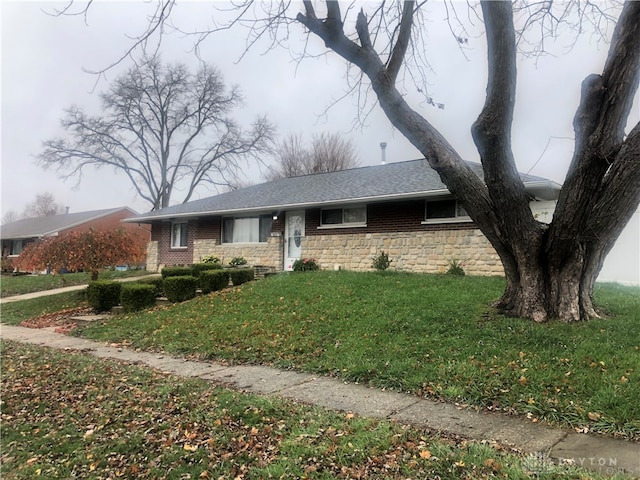 ranch-style home with a front yard