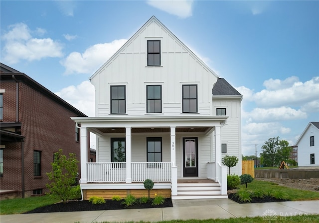 modern farmhouse featuring covered porch