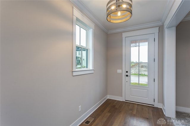 doorway to outside featuring dark wood-type flooring and ornamental molding