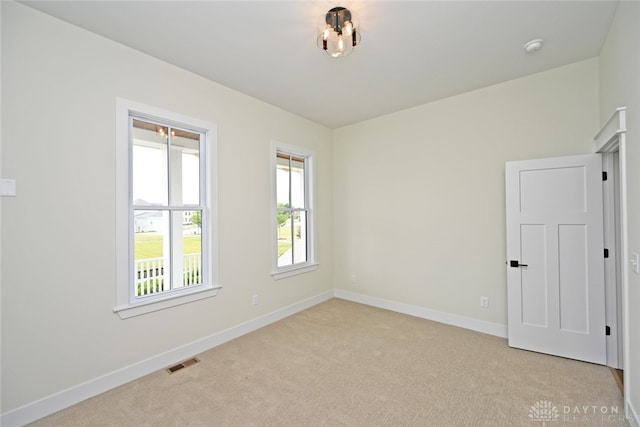 view of carpeted spare room