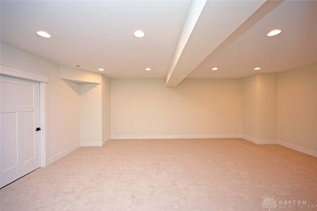 basement with light colored carpet