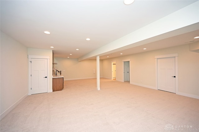 basement with light carpet