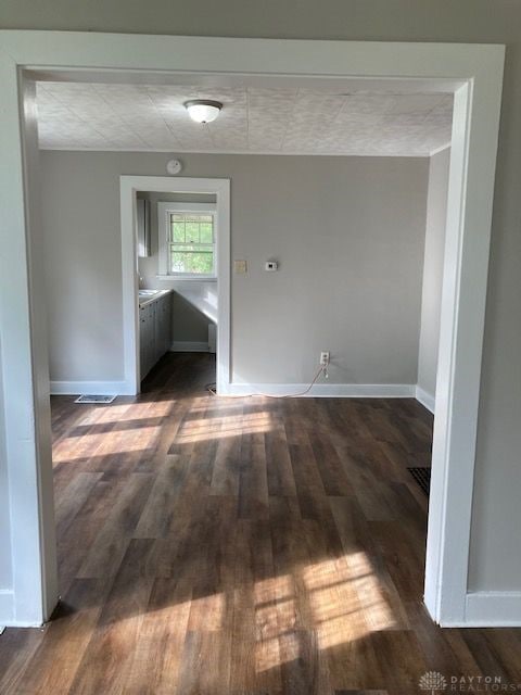 interior space featuring dark hardwood / wood-style flooring