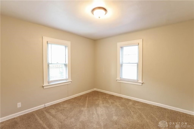 view of carpeted spare room