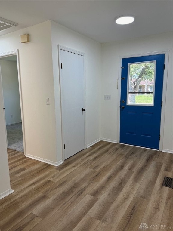 entrance foyer with hardwood / wood-style floors