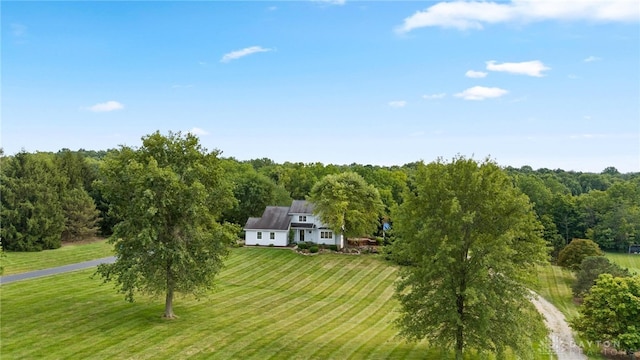 birds eye view of property featuring a rural view