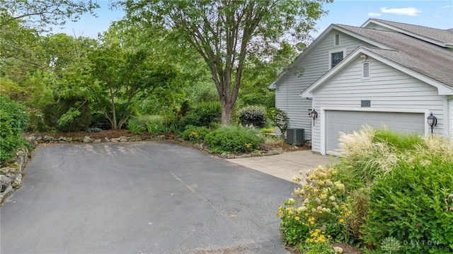 view of property exterior with cooling unit