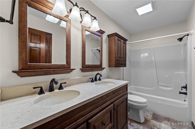 full bathroom with shower / bathing tub combination, vanity, and toilet