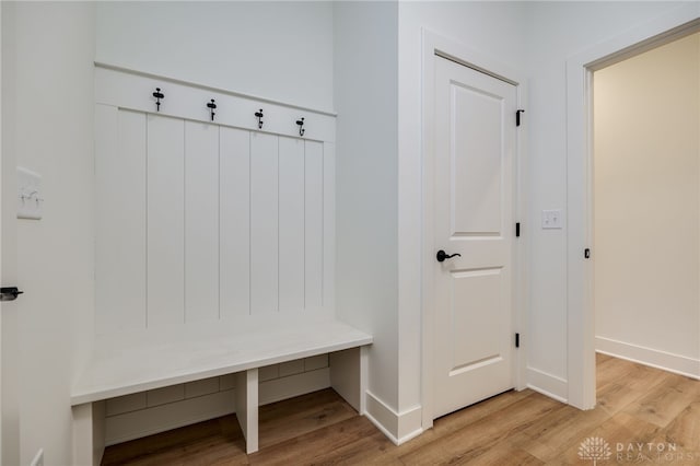 mudroom with light hardwood / wood-style flooring