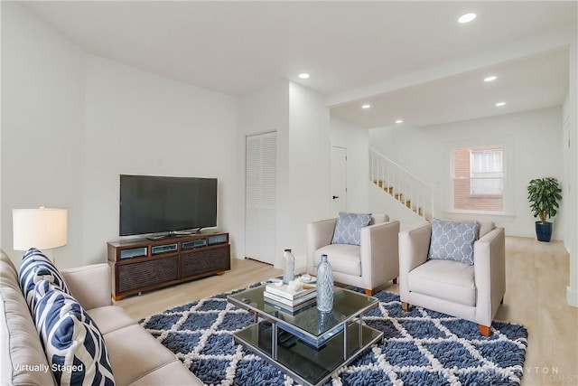 living room with hardwood / wood-style flooring