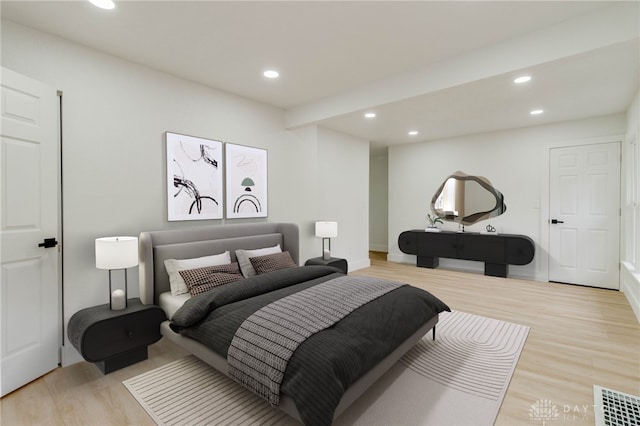 bedroom with light hardwood / wood-style flooring